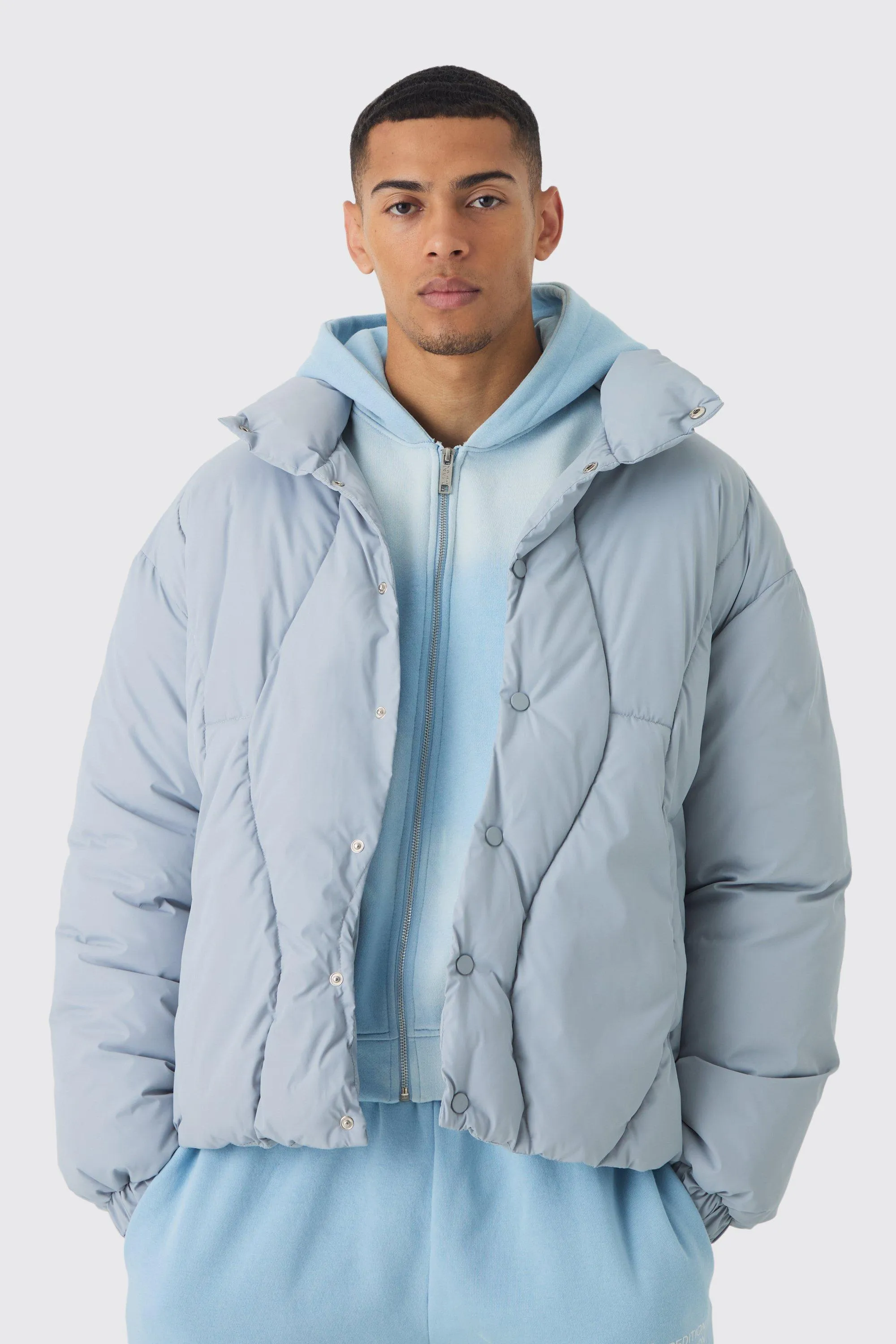 Abstract Quilted Funnel Neck Puffer In Grey