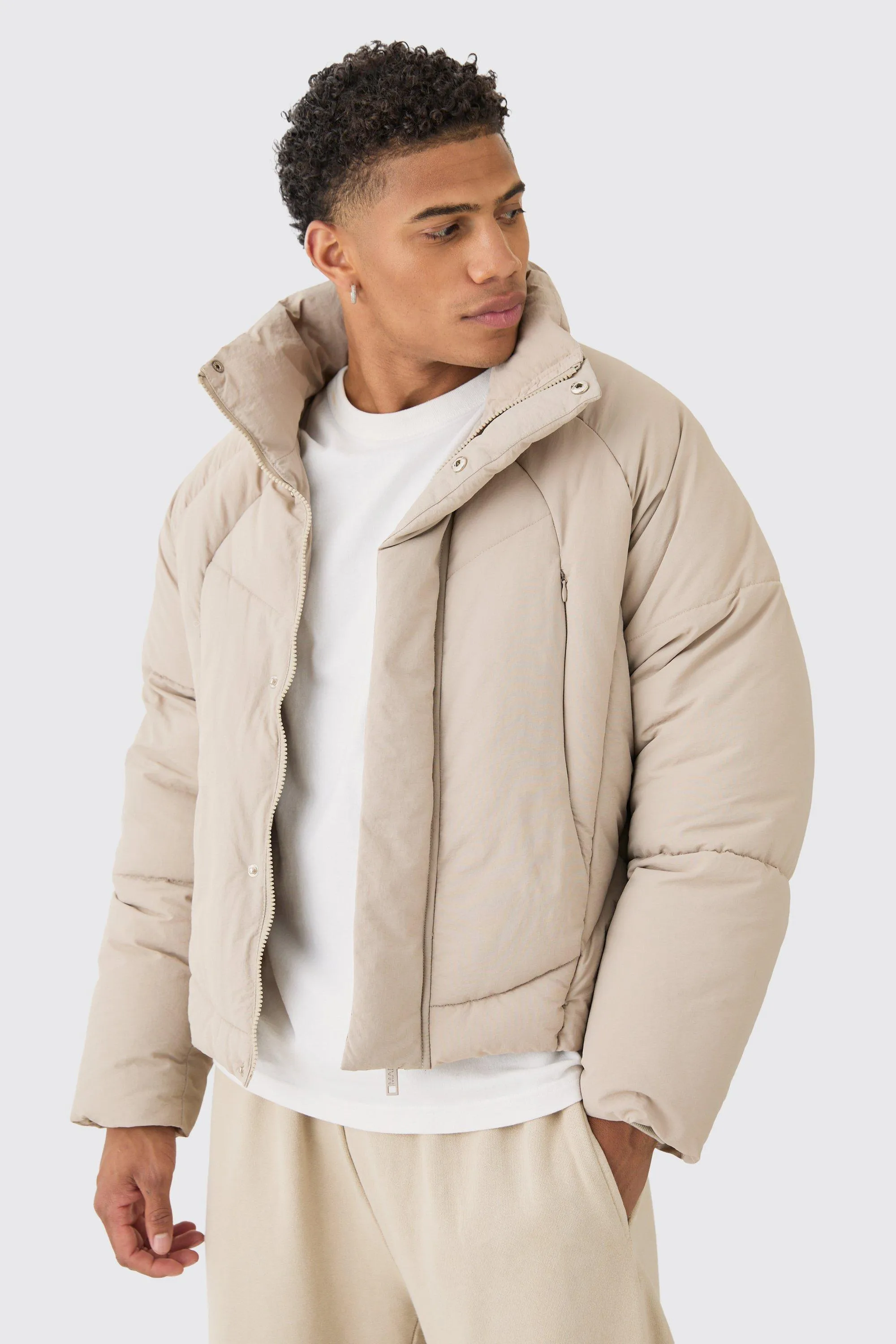 Boxy Abstract Quilted Funnel Neck Puffer In Stone