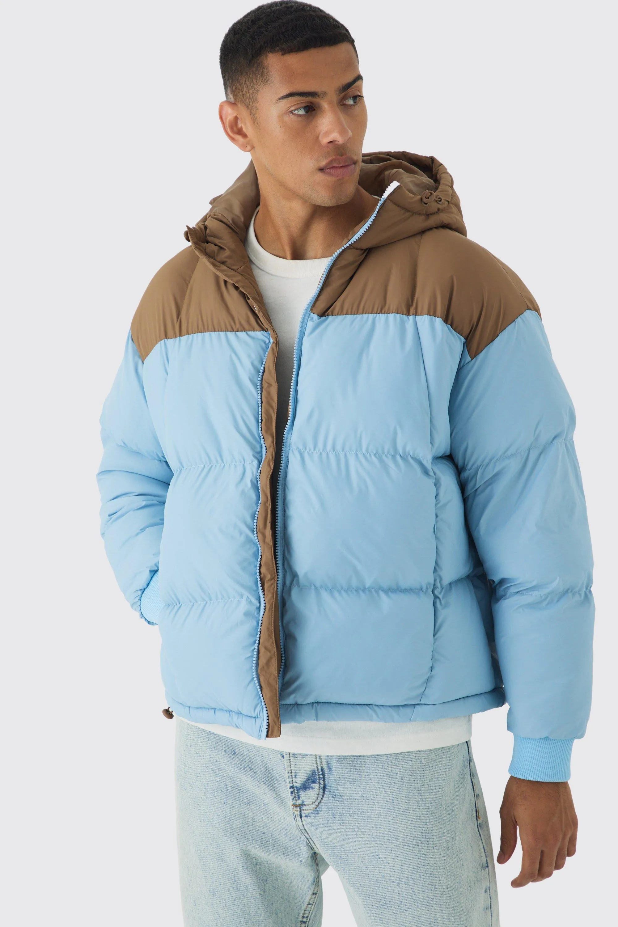 Boxy Curved Quilted Color Block Hooded Puffer In Light Blue