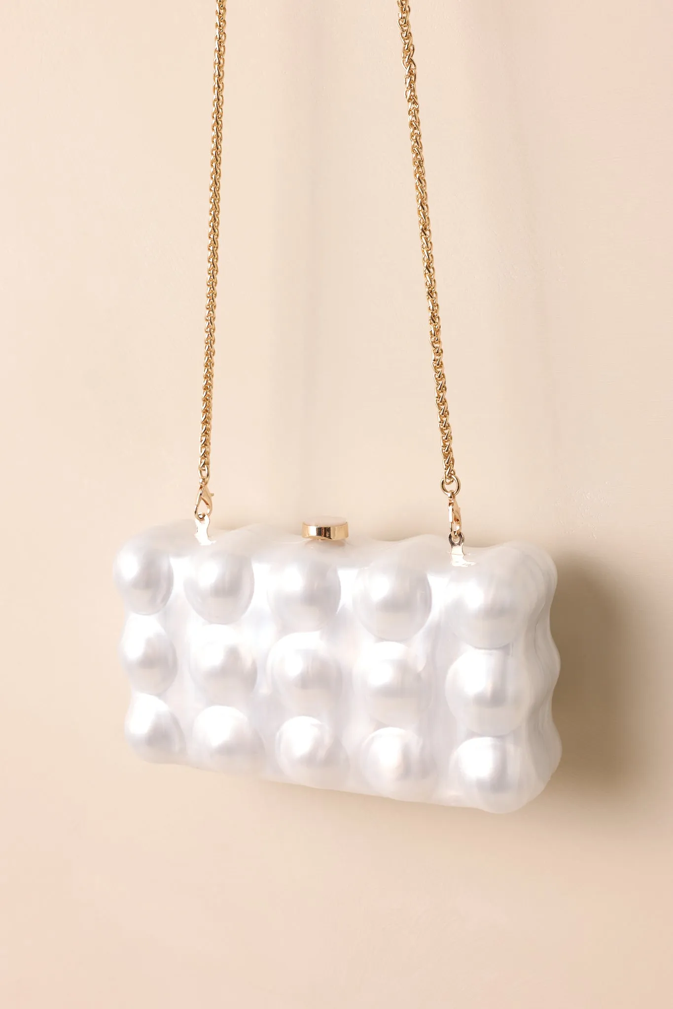 Eclipse’s Whisper Ivory Pearlescent Clutch