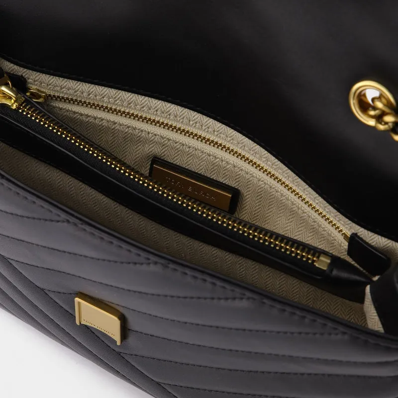Kira Chevron Convertible Shoulder Bag in black leather
