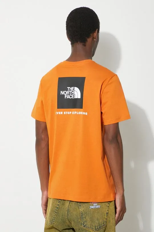 The North Face cotton t-shirt M S/S Redbox Tee men’s orange color with a print NF0A87NPPCO1